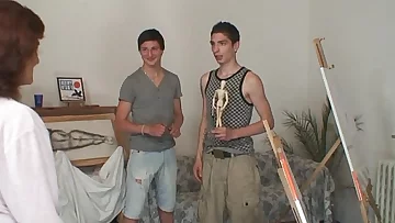 Naughty granny takes two youthful dicks