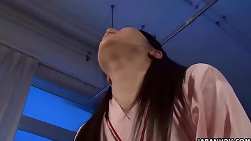 Japanese bitch at a ward sucking a cock off