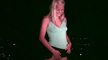 Youthfull blonde girl going to a public dogging gang bang orgy with strangers