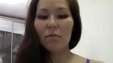 Japanese MILF Puts On Sexy Striptease
