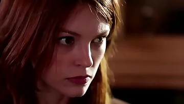 Redheaded les stunner seduced into pussylicking