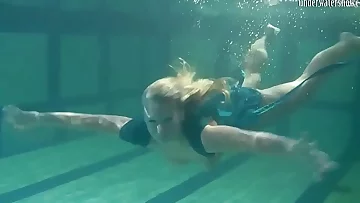 Blondie Feher with big firm tits underwater