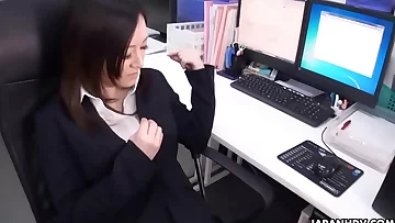 Asian office employee with pantyhose rubs her pussy with a sex toy