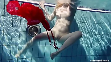 Russian teenie Lucie goes underwater swimming