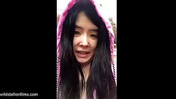 Japanese Teenie starlets in Bollywood Sumptuous and then displays large funbags outdoors in the rain
