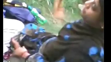 Indian Aunty with youthful guy frolicking with boobies & desi cunt