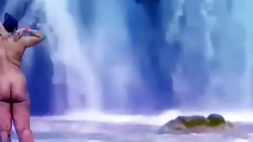 Desi publicly bare in front of water fall&period;