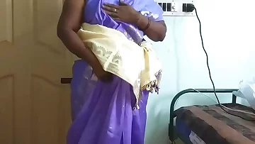 Desi bhabhi raising her sari demonstrating her beavers